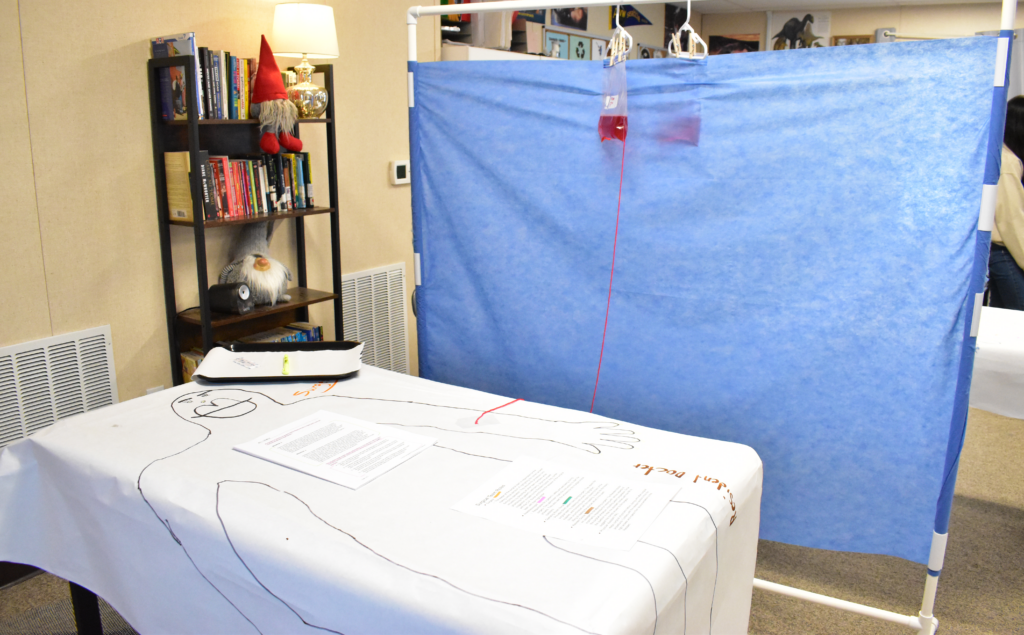 Mock surgical table with drawing of a patient